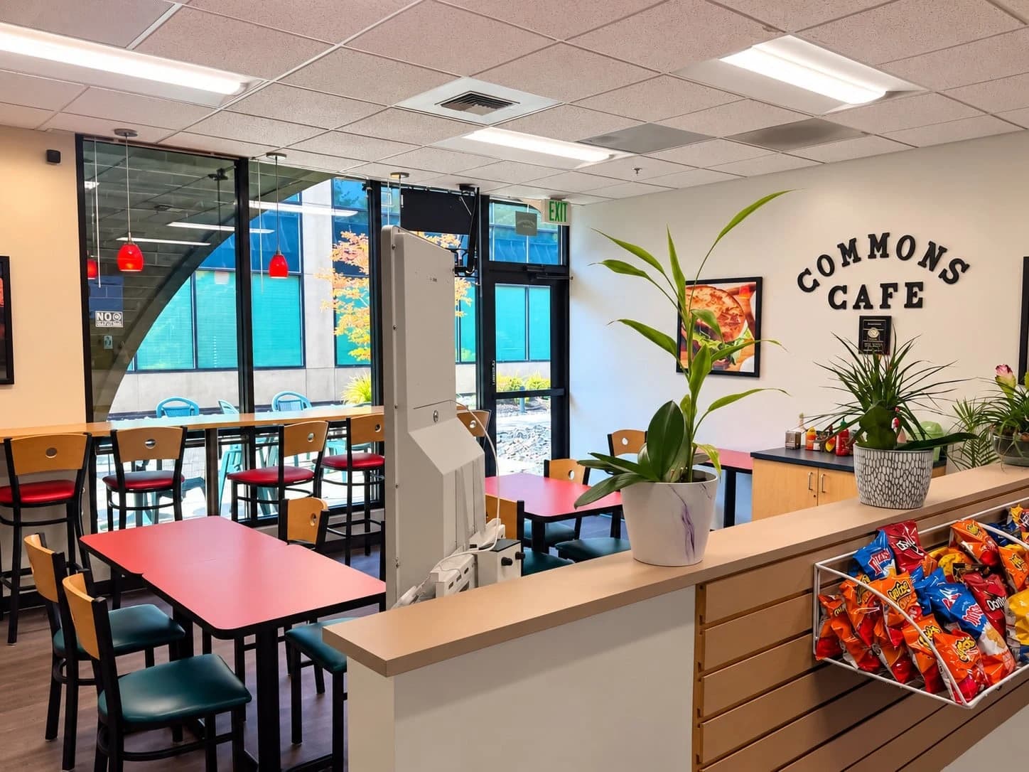 Commons Cafe seating, counter, and front windows